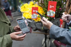 NAPAS đảm bảo hạ tầng thanh toán thông suốt dịp Tết Nguyên đán. (Ảnh: Vietnam+)