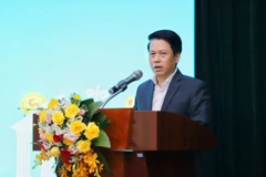 Ông Phạm Tiến Dũng - Phó Thống đốc Ngân hàng Nhà nước phát biểu tại hội thảo. (Ảnh: Vietnam+)