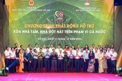 Đại diện lãnh đạo Đàng và Nhà nước chụp ảnh lưu niệm tại Chương trình. (Ảnh: Vietnam+)