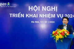 Phó Thống đốc Ngân hàng Nhà nước Phạm Tiến Dũng phát biểu tại hội nghị. (Ảnh: PV/Vietnam+)