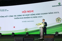Ông Nguyễn Thanh Tùng, Tổng Giám đốc Vietcombank phát biểu tại hội nghị. (Ảnh: PV/Vietnam+)