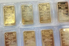 Lực giảm vẫn rất mạnh tới 3,5 triệu đồng, SJC chìm nghỉm về đáy gần 40 ngày. (Ảnh: Vietnam+)