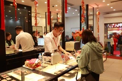 Giá vàng SJC giảm tới 1,5 triệu đồng phiên chiều ngày 22/3, tuột mốc 80 triệu đồng. (Ảnh: Vietnam+)