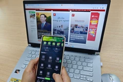 Tết là thời điểm tội phạm hoành hành nhằm, chiếm đoạt tài chính của các nạn nhân từ các tài khoản ngân hàng. (Ảnh: PV/Vietnam+)