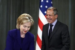 Ngoại trưởng 2 nước Nga, Mỹ tại Mátxcơva ngày 13/10. (Ảnh: Reuters)