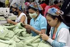Xuất khẩu hàng dệt may hiện chiếm một tỷ trọng khá lớn trong cơ cấu xuất khẩu của Việt Nam. (Ảnh: Trần Việt/TTXVN)