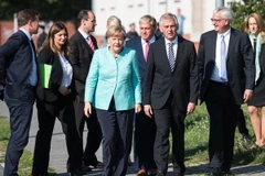 Thủ tướng Đức Angela Merkel đã tới thăm một trại tị nạn ở thủ đô Berlin. (Nguồn: AFP/TTXVN)