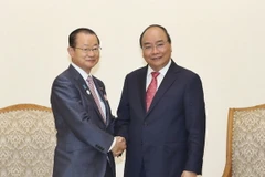 Thủ tướng Nguyễn Xuân Phúc tiếp Hạ Nghị sỹ, Chủ tịch Uỷ ban Ngân sách Hạ viện Nhật Bản Kawamura Takeo. (Ảnh: Thống Nhất/TTXVN)