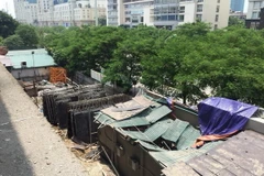 Hiện trường vụ tại nạn đứt cẩu tháp. (Ảnh: Nguyễn Thắng/TTXVN)