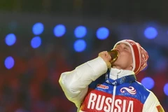 Một vận động viên Nga giành Huy chương Vàng nội dung trượt tuyết băng đồng 50km nam tại Olympic Sochi. (Nguồn: AFP/TTXVN)