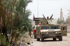 Binh sỹ Iraq làm nhiệm vụ tại thành phố Fallujah. (Nguồn: THX/TTXVN)