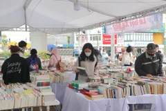 Loạt sự kiện 'Hội sách khai Xuân' mang đến cho độc giả cơ hội sở hữu những đầu sách mới với giá ưu đãi cùng nhiều phần quà hấp dẫn. (Ảnh: Việt Anh/Vietnam+)