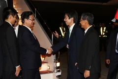 Quang cảnh lễ đón Thủ tướng Nguyễn Tấn Dũng đến sân bay Haneda, Tokyo. (Ảnh: Đức Tám/TTXVN)