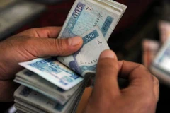 Đồng afghani giảm xuống mức thấp kỷ lục. (Nguồn: thefrontierpost.com)