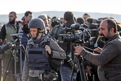 Hình ảnh các nhà báo tác nghiệp ở vùng chiến sự. (Nguồn: jordantimes.com)