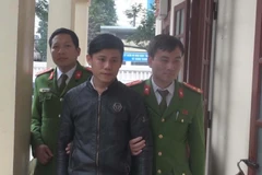 Hà Văn Khải bị lực lượng công an bắt giữ. (Ảnh: TTXVN phát)