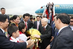 Lễ đón Tổng Bí thư Nguyễn Phú Trọng tại sân bay Quốc tế Pochentong ở Thủ đô Phnom Penh. (Ảnh: Trí Dũng/TTXVN)