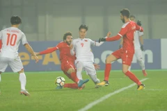 U23 Việt Nam (áo trắng) giành vé vào tứ kết U23 châu Á. (Nguồn: AFC)