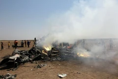 Hiện trường máy bay Mi-8 của Nga bị rơi. (Nguồn: Reuters)