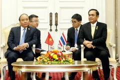 Thủ tướng Nguyễn Xuân Phúc và Thủ tướng Thái Lan Prayuth Chan-ocha. (Ảnh: Thống Nhất/TTXVN)