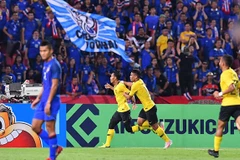 Malaysia (áo vàng) giành vé vào chung kết AFF Suzuki Cup 2018 sau khi hạ bệ Thái Lan. (Nguồn: Getty Images)