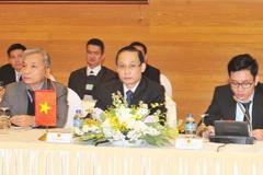 Đoàn đại biểu Việt Nam do Thứ trưởng, Chủ nhiệm Ủy ban Biên giới Quốc gia Lê Hoài Trung làm trưởng đoàn tại cuộc họp. (Ảnh: Nguyễn Khang/TTXVN)