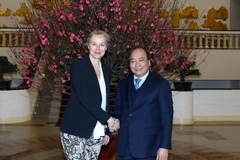 Thủ tướng Nguyễn Xuân Phúc tiếp Bộ trưởng Ngoại thương và Hợp tác phát triển Hà Lan Sigrid Kaag. (Ảnh: Thống Nhất/TTXVN)