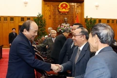  Thủ tướng Nguyễn Xuân Phúc với các đại biểu. (Ảnh: Thống Nhất/TTXVN)