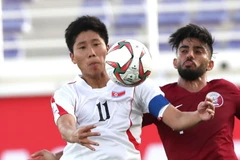 Triều Tiên (áo trắng) sẽ giúp Việt Nam đi tiếp? (Nguồn: AFC)