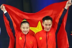 Phan Thế Gia Hiển-Bùi Minh Phương giúp Aerobic lập hat-trick huy chương Vàng. (Ảnh: Vietnam+)