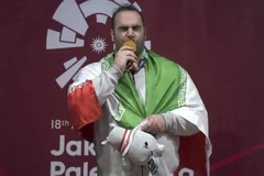 Behdad Salimikordasiabi giành tấm HCV lịch sử. (Nguồn: AFP)