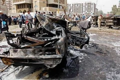 Hiện trường một vụ đánh bom ở Iraq. (Nguồn: AP)