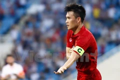 Công Vinh ghi bàn cho tuyển Việt Nam. (Ảnh: Minh Chiến/Vietnam+)