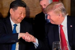 Tổng thống Mỹ Trump (phải) trong cuộc gặp Chủ tịch Trung Quốc Tập Cận Bình. (Nguồn: AFP/Getty Images)