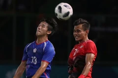 Indonesia (áo đỏ) thắng trận ra quân ASIAD 2018. (Nguồn: AFC)