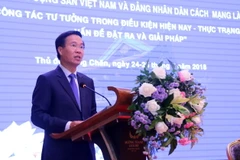 Đồng chí Võ Văn Thưởng đang phát biểu khai mạc tại Hôi thảo. (Ảnh: Phạm Kiên/Vietnam+)