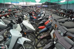 Xác minh tin bãi giữ xe cấu kết cảnh sát tháo đồ phương tiện vi phạm