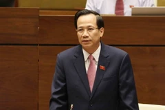 Bộ trưởng Bộ Lao động-Thương binh và Xã hội Đào Ngọc Dung trả lời chất vấn. (Ảnh: Phương Hoa/TTXVN)