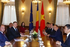 Thủ tướng Nguyễn Xuân Phúc hội kiến với Tổng thống Romania Klaus Werner Iohannis. (Ảnh: Thống Nhất/TTXVN)