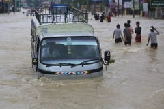 Cảnh ngập lụt sau mưa lớn tại khu vực Bago, Myanmar ngày 28/7. (Ảnh: THX/TTXVN)