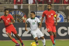Indonesia (áo trắng) đánh bại Singapore 2-1 để vào bán kết AFF Cup 2016. (Nguồn: Affsuzukicup)