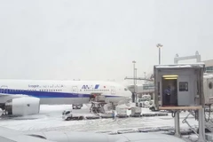 Tuyết rơi dày ở Sapporo ảnh hưởng đến giao thông hàng không. (Nguồn: scmp.com)