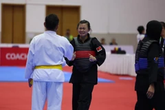 Thu Nghĩa hạnh phúc sau khi đánh bại đối thủ Malaysia để giành HCV