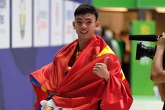 Huy Hoàng đóng góp 2 HCV cho đoàn Thể thao Việt Nam. (Ảnh: Vũ Anh Tú/TTXVN)
