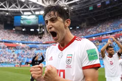 Niềm vui của cầu thủ Iran sau chiến thắng. (Nguồn: Getty Images)