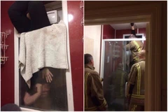 Cô gái rơi vào tình cảnh trớ trêu và được nhân viên cứu hỏa... giải cứu. (Nguồn: straitstimes.com)