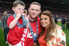 Vợ chồng Rooney và bé Kai. (Nguồn: Getty Images)