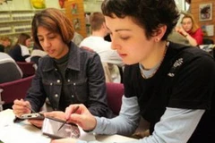 Người dân Mỹ và thiết bị không dây. (Nguồn: Internet)