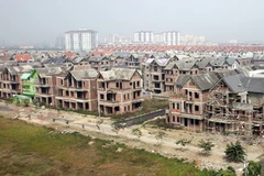 Xây dựng tại Khu đô thị Việt Hưng, quận Long Biên, Hà Nội. (Ảnh: Tuấn Anh/TTXVN)