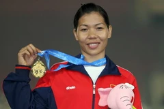 Vũ Thị Hương giành huy chương vàng nội dung 200m nữ với thành tích 23 giây 31. (Ảnh: Quang Nhựt/TTXVN) 